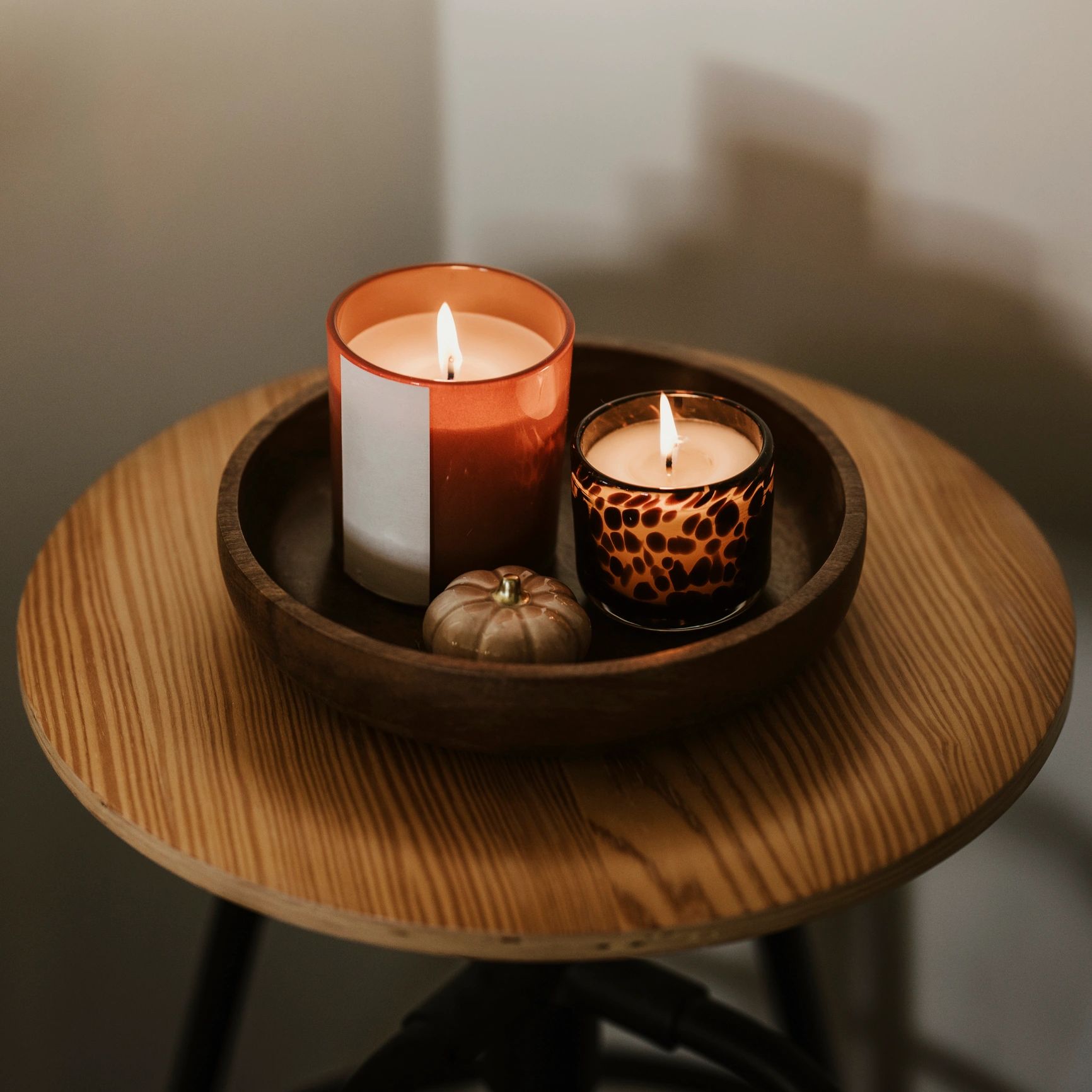 8 oz soy candle in an amber glass jar on a clean white background